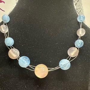 necklace with blue and pink pearls